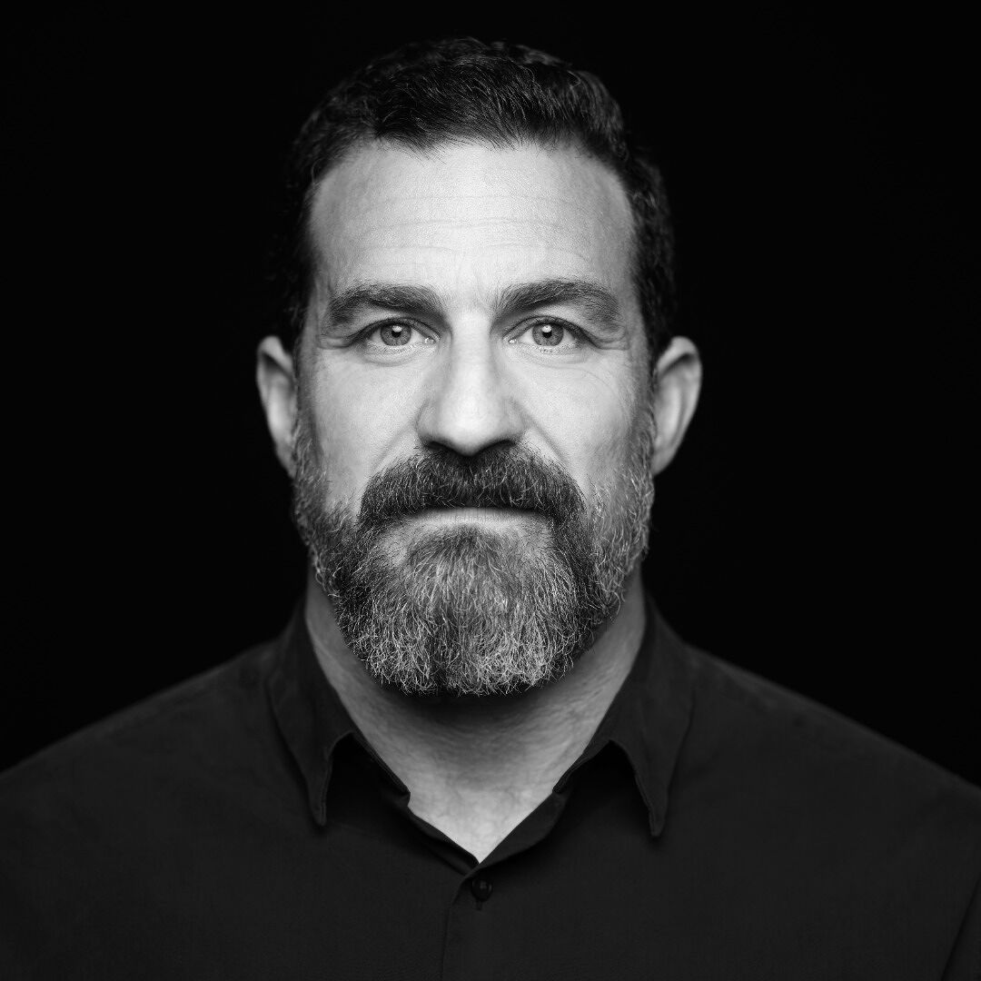 Dr. Andrew Huberman, neuroscientist and podcast host, headshot